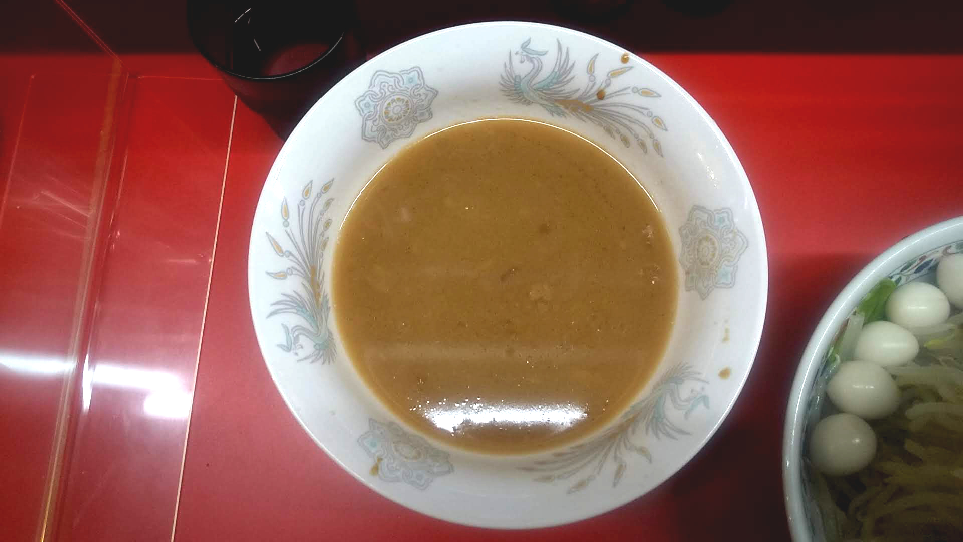 ハナイロモ麺のつけ麺小のつけ汁の写真