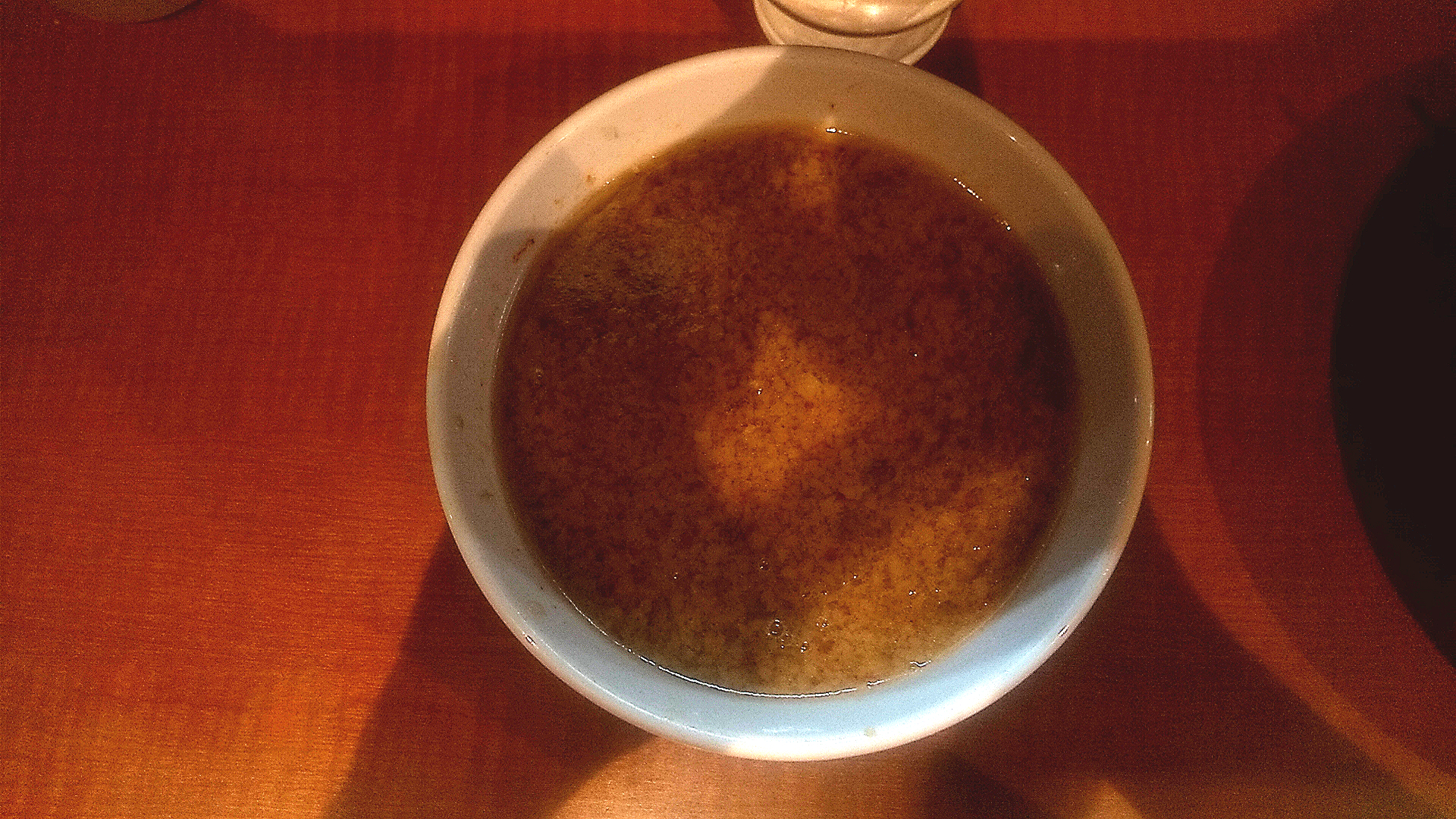 ぽっぽっ屋のつけ麺のつけ汁の写真